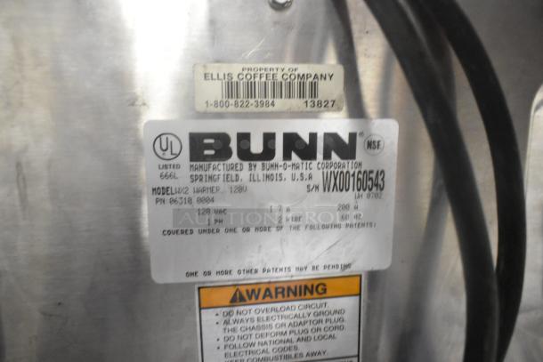 Bunn WX2 metal countertop 2 burner coffee pot warmer, 120 volts, 1 phase. Labels show manufacturer details and safety warnings.
