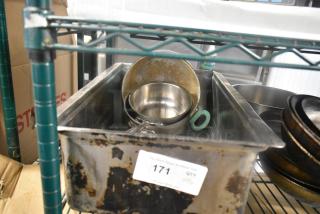 Four metal items including a drop-in bin and sauce pans, showing signs of wear and rust. Auction label indicates item 171.