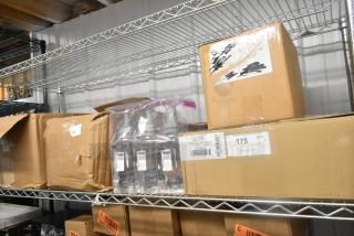 Boxes of carbonless rolls, GoJo foam handwash bottles, and a Scott dispenser on metal shelf. Visible labels show item counts.