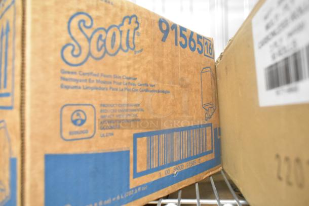 Cardboard box labeled "Scott" and "91565" containing foam skin cleanser. Eco-certified, with visible barcode.