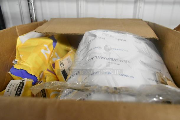 Box with carbonless rolls, GoJo foam handwash, Scott dispenser, and various items. Packaging shows minor wear.