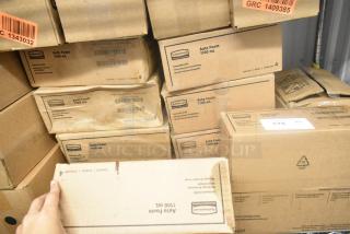 Boxes of Rubbermaid Auto Foam 1100 mL refills stacked, unopened condition, labels show item details and quantity.
