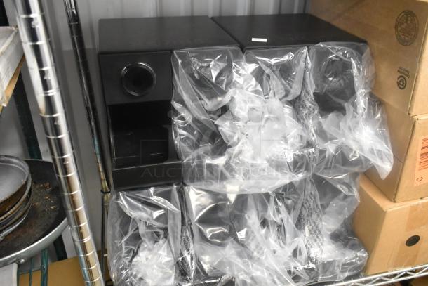 17 assorted items including Rubbermaid Auto Foam and Flavia Cucumber Lime Mint, wrapped in plastic, stored on shelves.