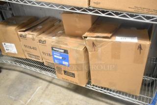 Boxes of Coastwide glass cleaner and Purell 9118-02 hand sanitizing wipes on a shelf, in unopened condition.
