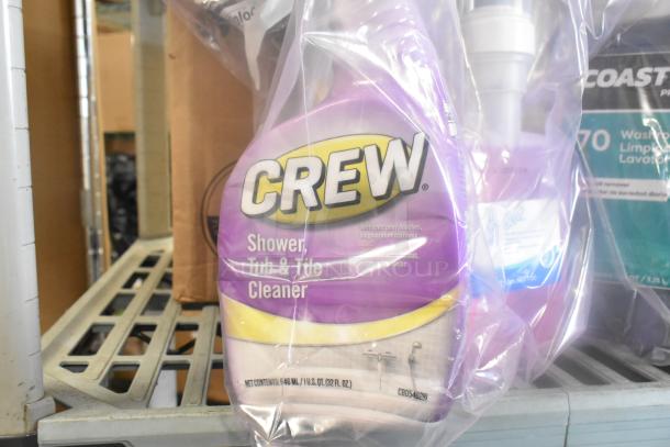 Assorted cleaning products including Crew Shower Cleaner in packaging on a shelf, part of a 20-item auction lot.