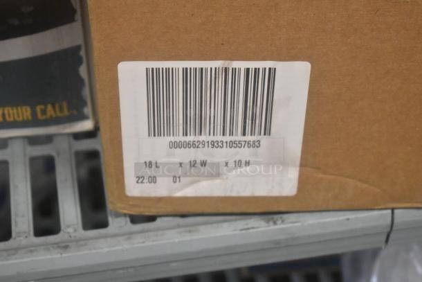 Cardboard box with barcode label, dimensions 18L x 12W x 10H. Contains 7 various items, including glasses.
