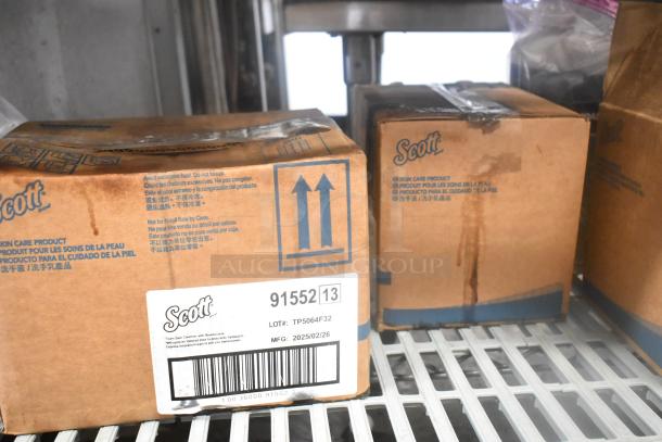 Boxes of Scott Foam Skin Cleanser, labeled as skin care product with manufacturing date 2025/02/26. Lot TP5064F32.