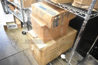 Boxes containing Dixie hot cup lids and solar flower lights on metal shelves, ready for auction. Labels visible with item details.