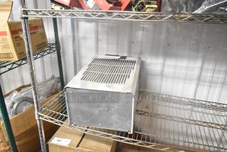 Pentair SpectraCool Narrow Compact Indoor Air Conditioner, 115V, 1 Phase, displayed on a wire shelf. Model N170216G010.