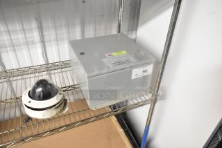 Berner Control Panel, 120 Volts, 1 Phase, gray metal, with visible labels on top, in good condition on a shelf.