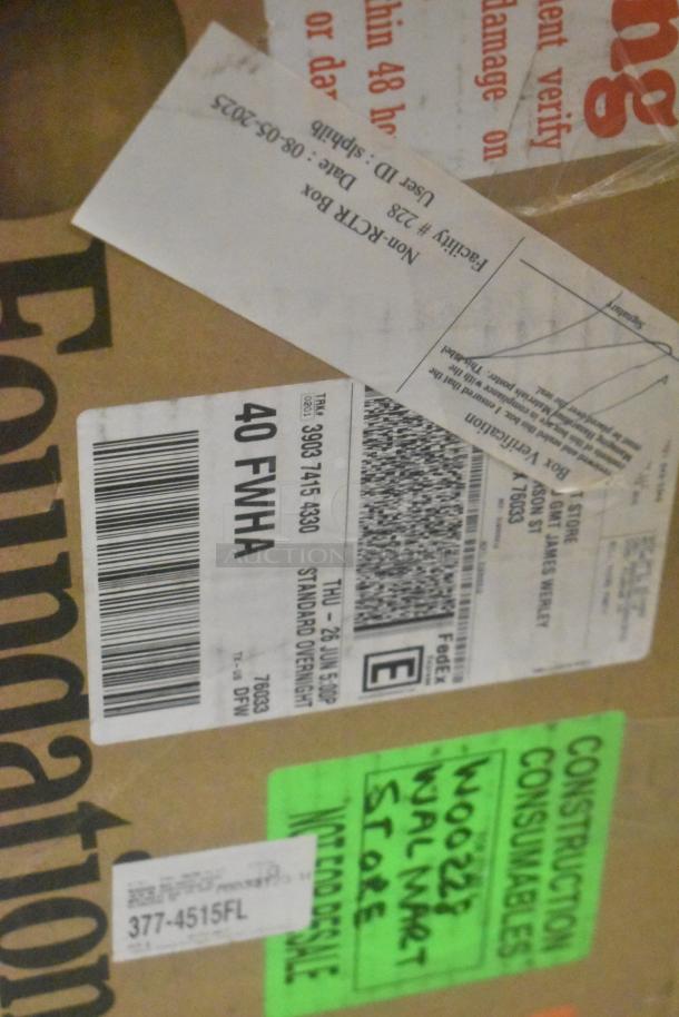 Shipping box with various labels, including FedEx barcode, Walmart store note, and construction consumables marking.