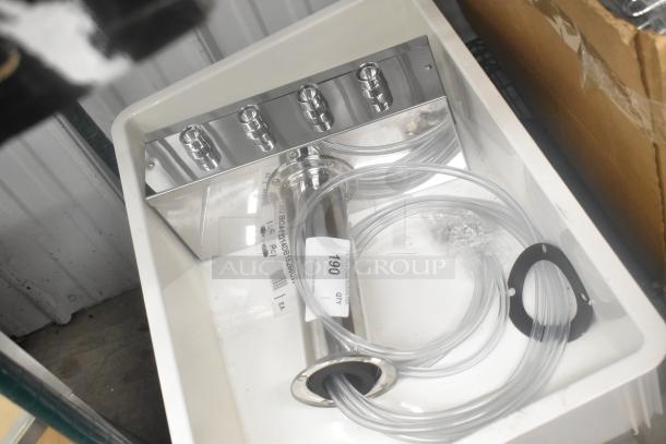 Brand new stainless steel 4 tap beer tower in scratch and dent condition, with labels and tubing included.
