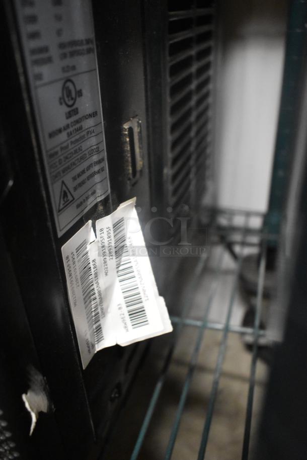 2022 window mount air conditioner with visible label. UL listed, model information, and specifications shown.