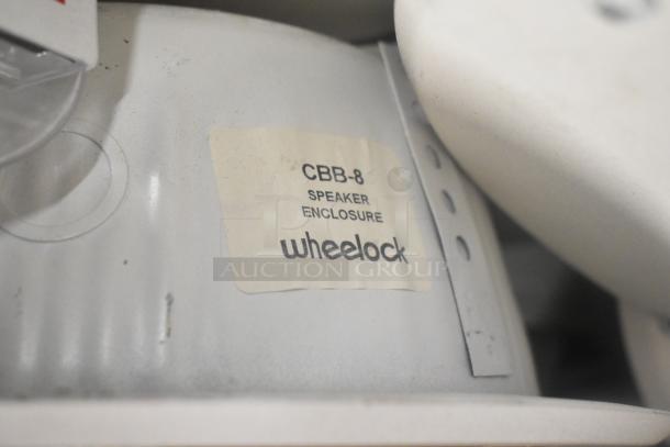 Lot of CBB-8 ceiling mount speakers by Wheelock. Visible label reads "CBB-8 Speaker Enclosure". Condition not specified.
