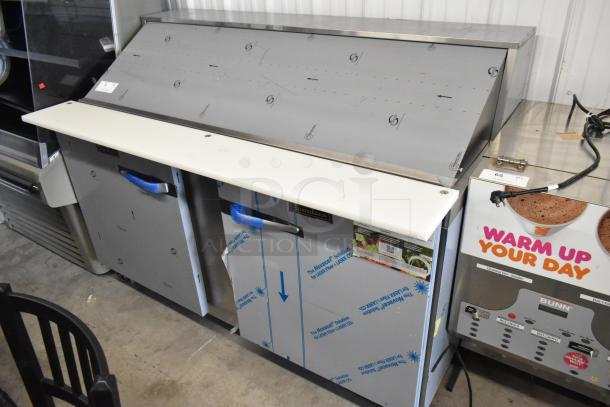 Traulsen UPT6024-LR stainless steel sandwich prep table, bain marie top, brand new with protective wrap, on casters.