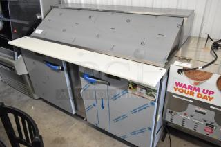 Traulsen UPT6024-LR stainless steel sandwich prep table, bain marie top, brand new with protective wrap, on casters.
