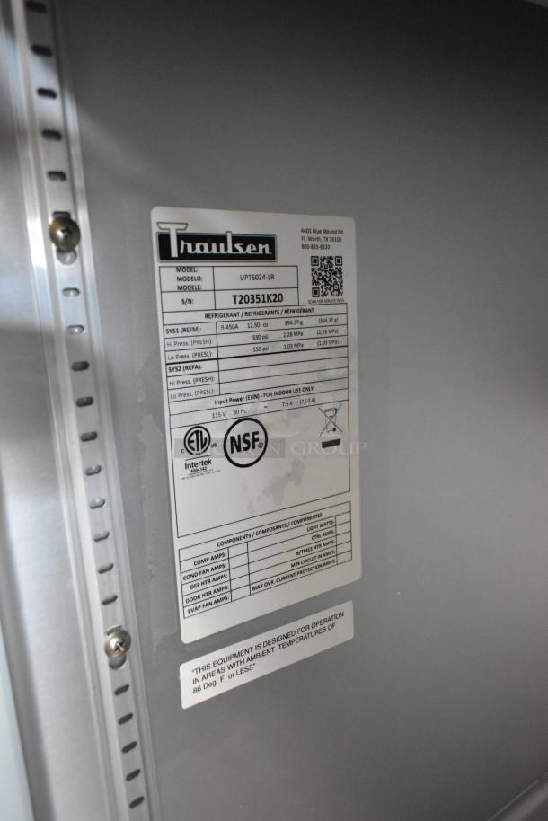 Traulsen UPT6024-LR stainless steel prep table label. Model, serial number, compliance logos, and power specs visible.