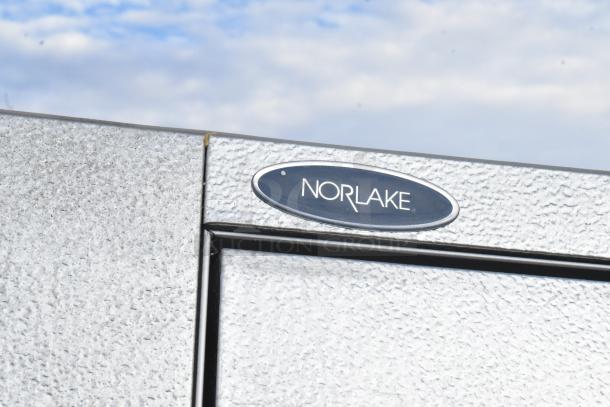 Norlake Self-Contained Walk-In Cooler with CPB075PC-5-0 Condenser. Visible Norlake label. Silver textured exterior.