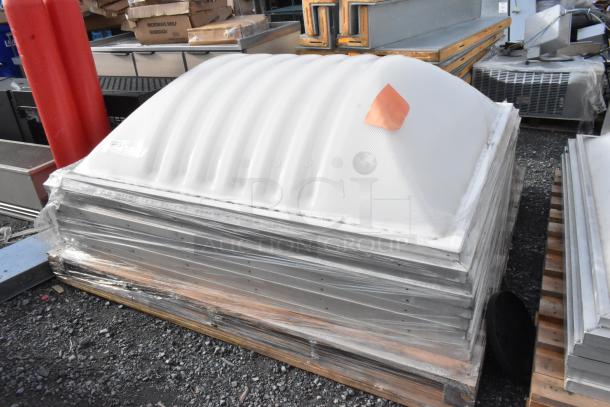Stacked 5 white dome covers on pallets; each cover features a grooved design. Wrapped in plastic, in good condition.