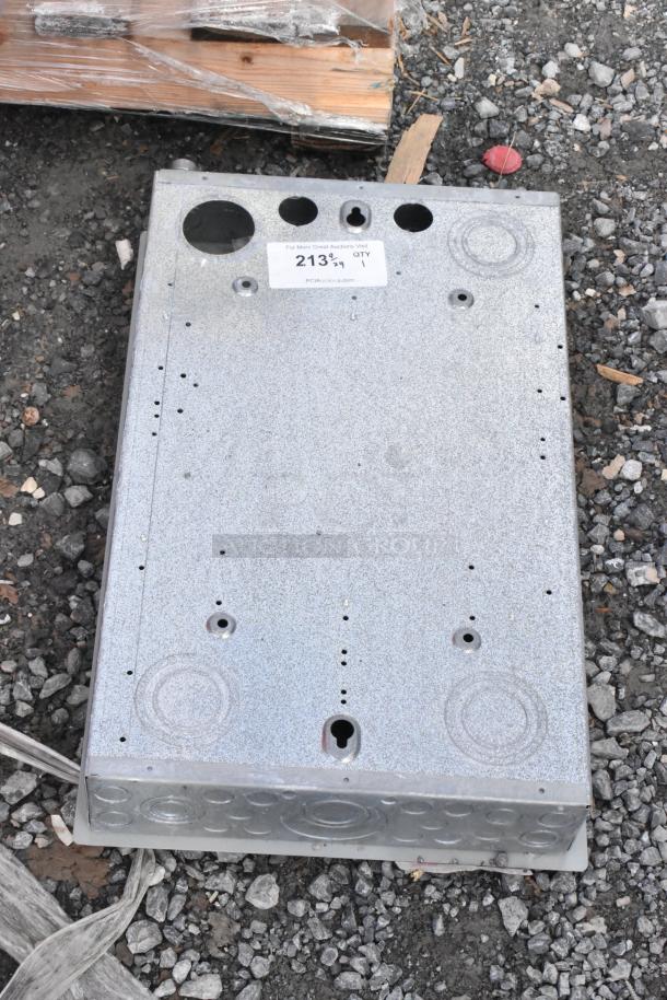 Gray metal electrical box with multiple circular knockouts and screw holes, labeled "213" for auction. Excellent condition.