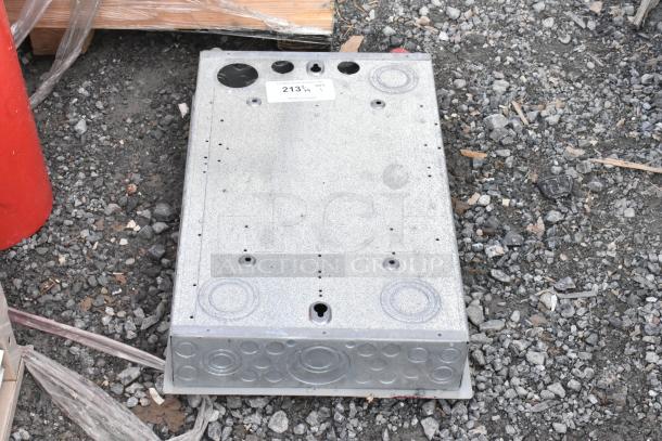 Gray metal electrical box on gravel surface, features knockouts and labeled "213" with quantity 1. Used condition.
