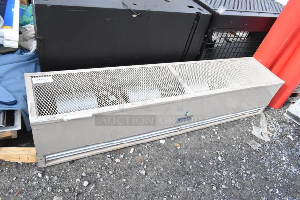 Berner FSA-2-72 metal air curtain, 120 volts, 1 phase, with protective grille cover. Rugged design, used condition.