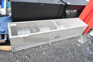 Berner FSA-2-72 metal air curtain, 120 volts, 1 phase, with protective grille cover. Rugged design, used condition.