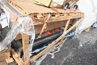 Brand new Giles GHM-8C hot food merchandiser in packaging; visible scratch and dent, 7-well, 208/240V, model marked on crate.