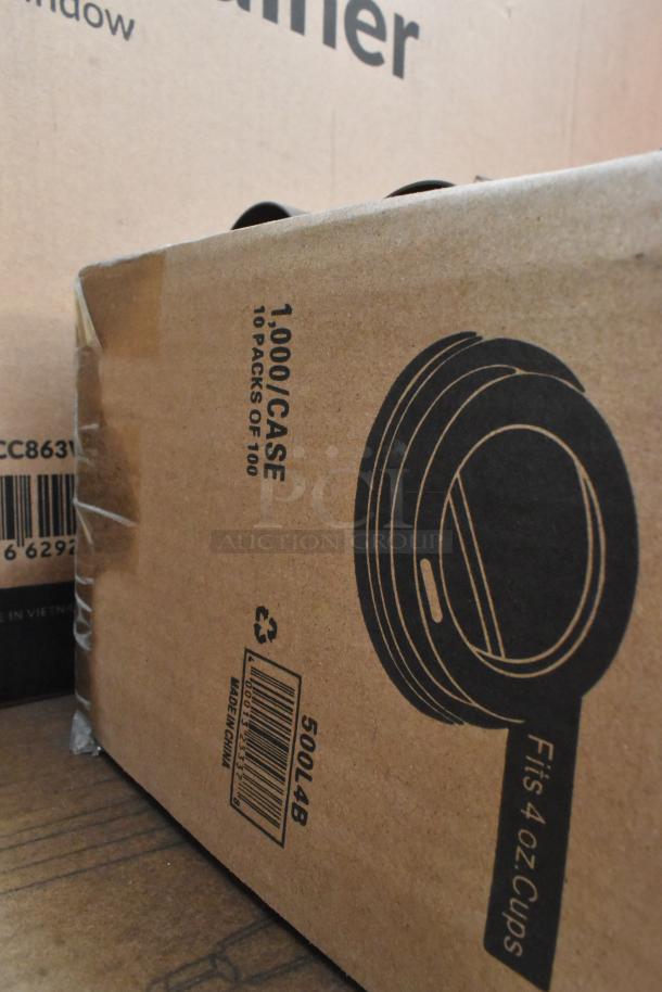 Box of 1,000 Choice 4 oz. black hot paper cup travel lids, code 500L4B, shown in packaging with barcode.