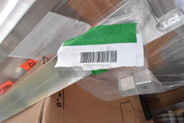 15 BRAND NEW SCRATCH AND DENT items, including 600TMAPR6KD bun pan rack. Barcode shown on packaging.