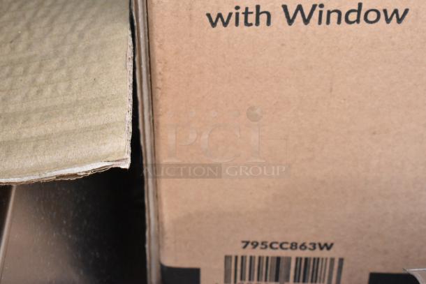 Close-up of a cardboard box with partial text "with Window" and barcode "795CC863W" visible, indicating packaging details.