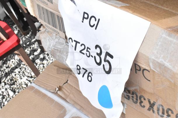 Boxes labeled "PCI ST25-35," containing 12 new scratch and dent items like shelving and racks.