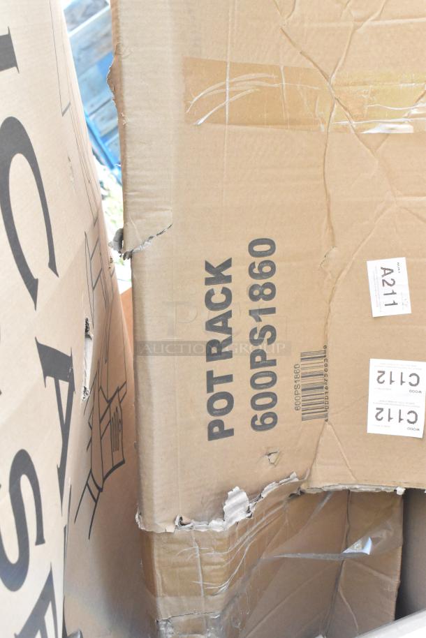 Cardboard boxes labeled "Pot Rack 600PS1860," showing slight dents. Tags indicate A211 and C142.
