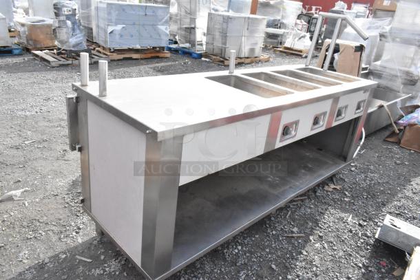 Seco stainless steel 4-bay steam table with under shelf, 208 volts, commercial-grade, outdoor setting, lightly used condition.