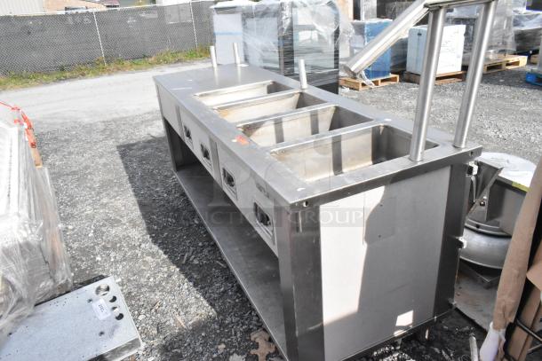 Seco Stainless Steel Commercial 4 Bay Steam Table with under shelf, 208 volts, used condition, ideal for catering.