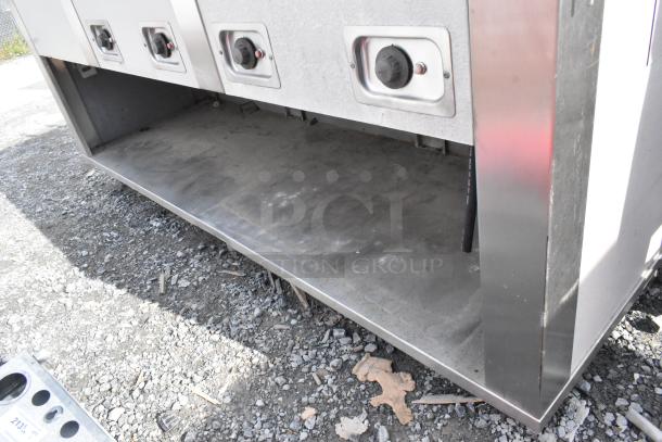 Seco stainless steel commercial 4 bay steam table with under shelf, 208 volts. Slightly used condition, surface wear visible.