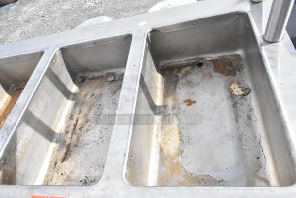 Seco stainless steel 4-bay steam table with under shelf, 208 volts. Visible wear and residue in compartments.