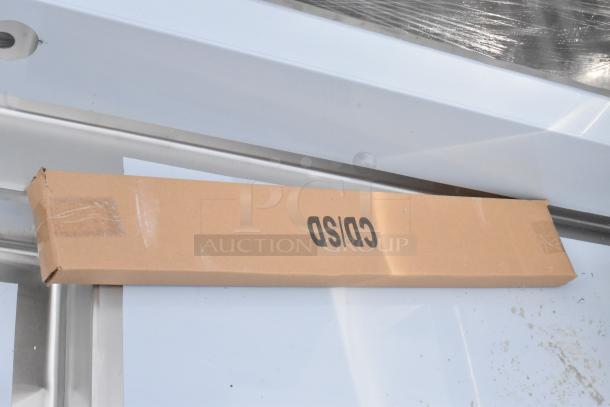 Regency 600DDT72R 6' Soiled Dish Table, 16 Gauge, Right Drainboard, brand new, visible scratches and dents, packaged.