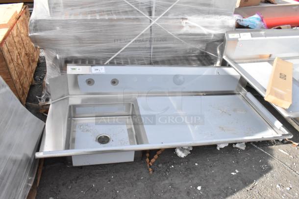 Brand new Regency 600DDT72R 16 gauge stainless steel 6' soiled dish table with right drainboard. Scratch and dent condition.