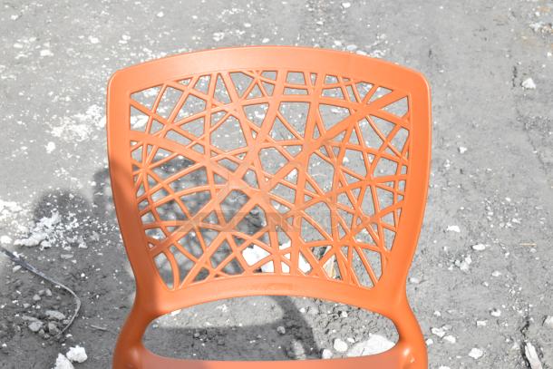 Lancaster Table & Seating Flora Terracotta chair, webbed resin back, scratch and dent, brand new condition.