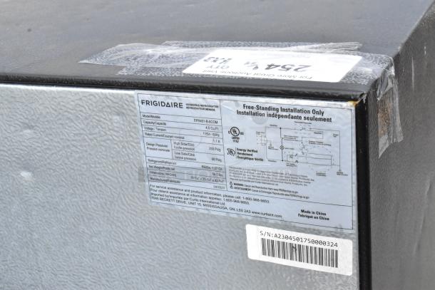 Frigidaire EFR451-B-6COM label showing model, 4.5 cu. ft. capacity, 115V, UL listed, made in China. Suitable for freestanding use.