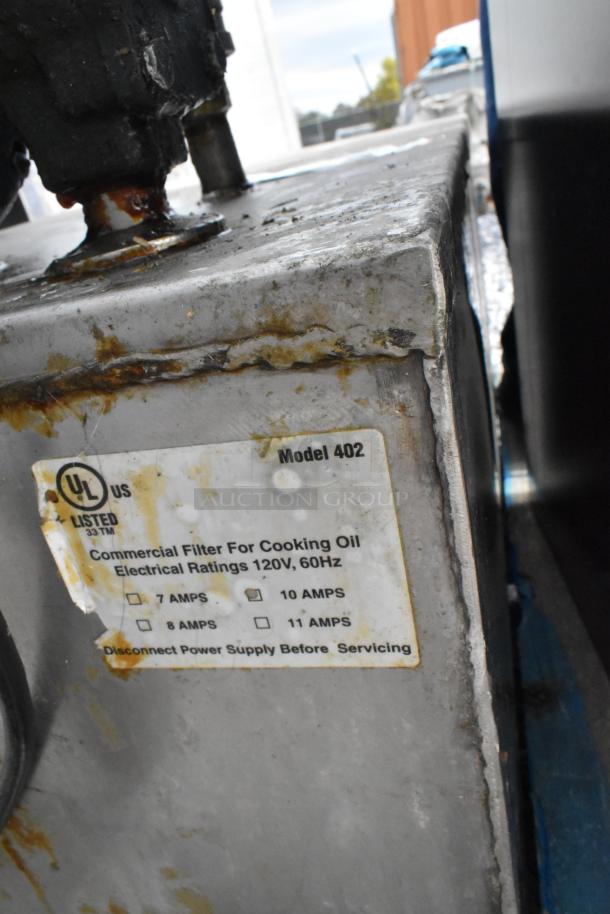 Metal Commercial Portable Fryer Oil Filter, Model 402, UL listed, 120V, 1 Phase, visible wear and rust.