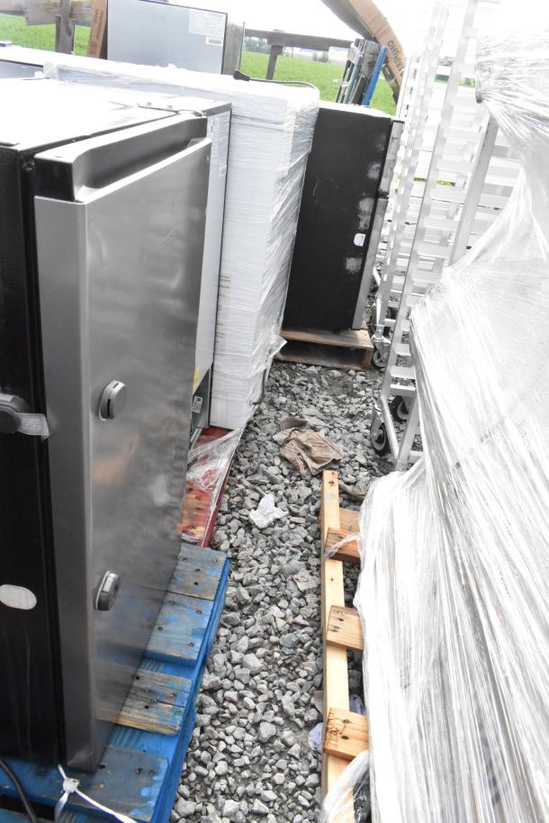 BAVFM Mini Cooler, 2-drawer filing cabinet, and metal rack on pallets. Items appear new, wrapped in plastic.