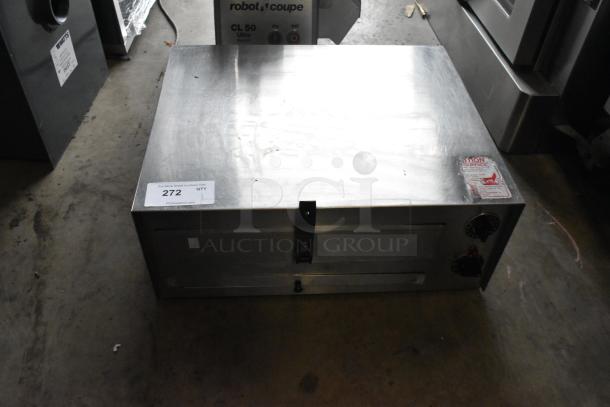 Wisco 560 stainless steel commercial countertop snack/pizza oven, 120 volts, 1 phase. Features dials and caution label.