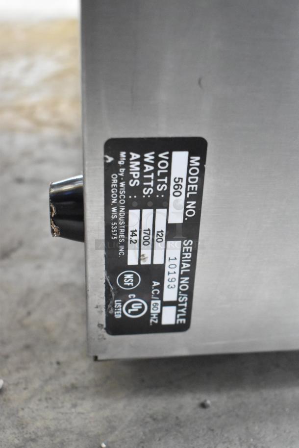 Wisco 560 stainless steel countertop snack/pizza oven. Label shows 120 volts, 1700 watts, 142 amps, NSF and UL listed.
