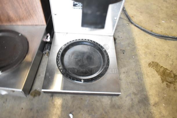 Bunn stainless steel commercial coffee machine with 3 burners and hot water dispenser, 115V, 1 Phase, used condition.