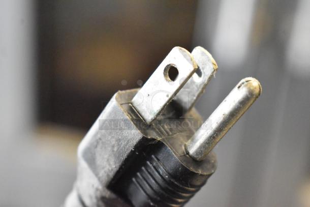 Close-up of a power plug for a Bunn Stainless Steel Commercial Countertop 3 Burner Coffee Machine, 115 Volts, 1 Phase.