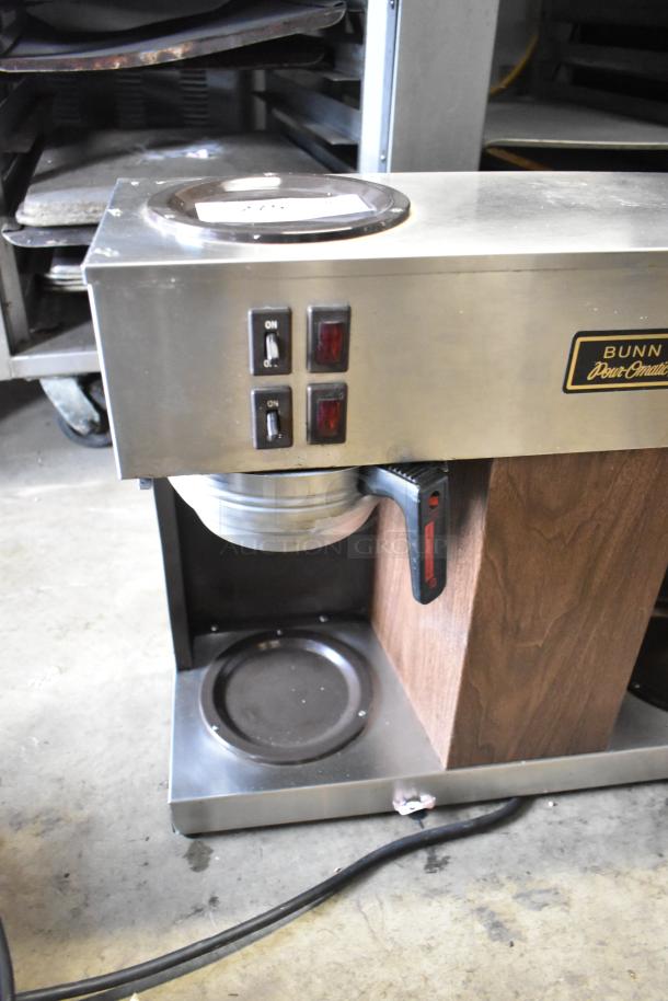 Bunn VPR commercial coffee machine with 3 burners, metal brew basket, stainless steel, 115V, used condition.