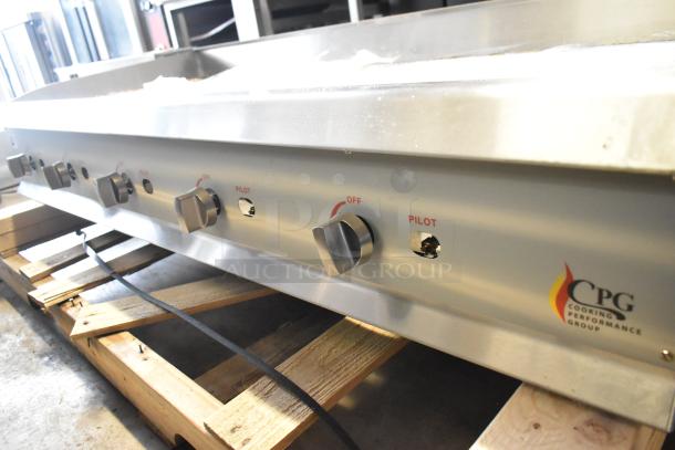 BRAND NEW CPG 351GMCPG60NL 60" gas griddle with manual controls, 150,000 BTU, scratch and dent, stainless steel, on wooden pallet.