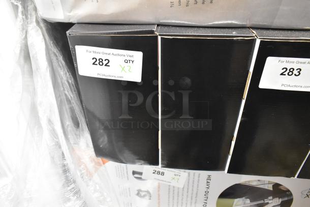 Alt Text: Black boxes labeled with auction tags, containing 2 new AvaMix 928IBHD21 21" heavy-duty immersion blenders.